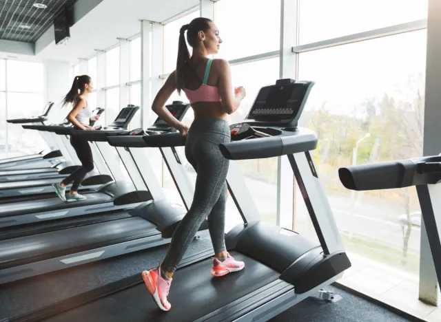 woman strength walking on treadmill, concept of good exercise for weight loss