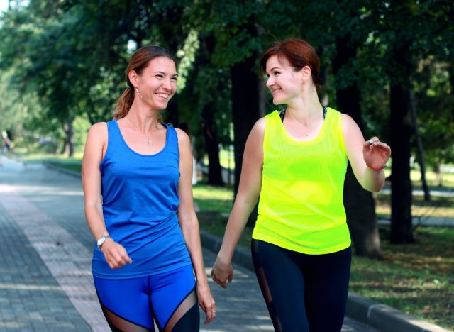 two female friends walking out